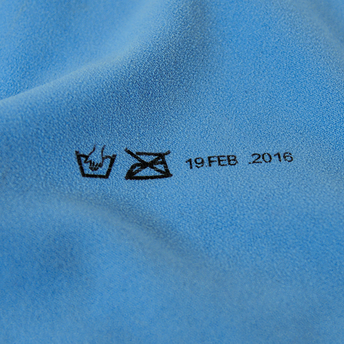 JetStamp Etikettieranwendung auf Textil JetStamp Etikettieranwendung auf Textil